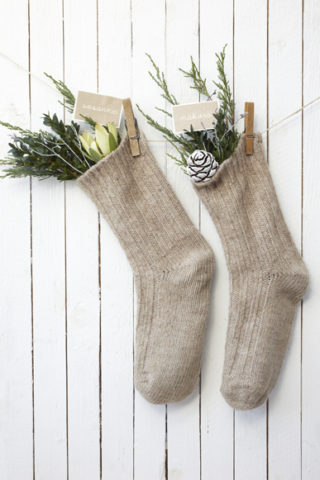 natural christmas stocking with greenery