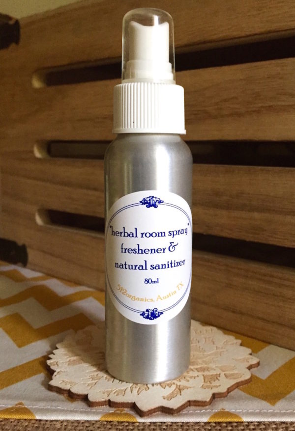 512organics bottle of herbal room spray on laser cut wood